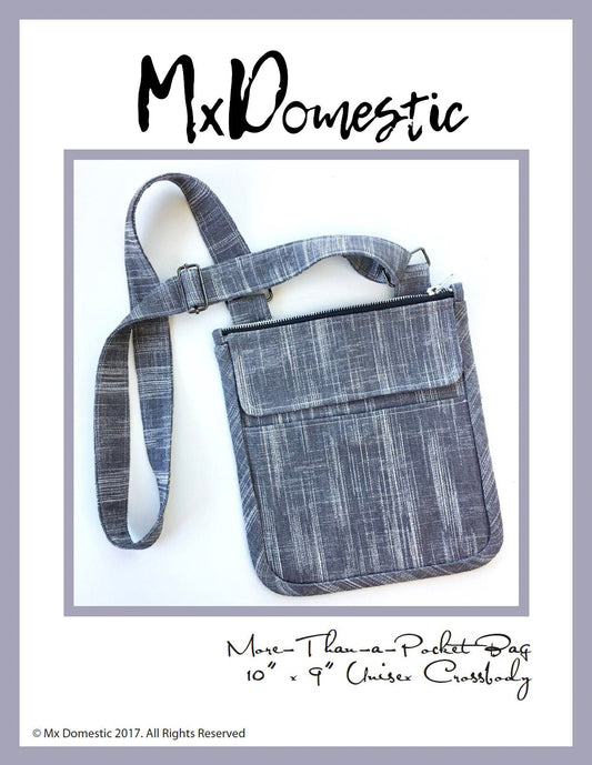 May include: A gray crossbody bag with a zipper closure and a flap pocket. The bag is 10 inches by 9 inches and has a strap. The text on the image reads: 'More-Than-a-Pocket Bag', '10' x '9', 'Unisex Crossbody', '© Mx Domestic 2017. All Rights Reserved'.