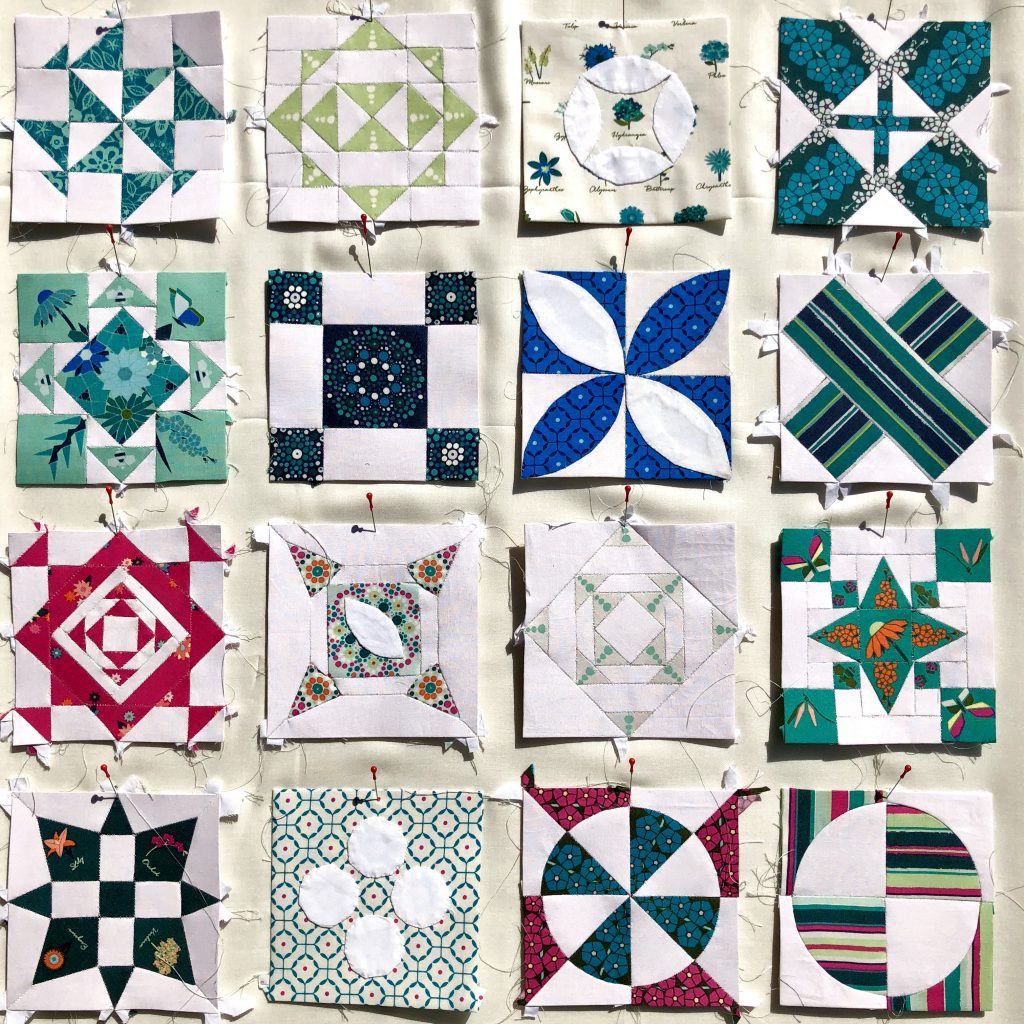 multiple white and patterned fabric squares