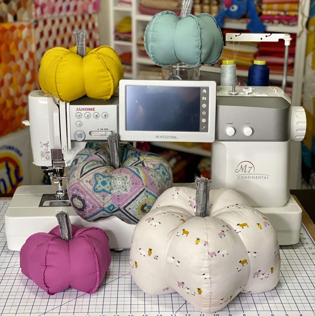  Fabric pumpkins around the sewing machine